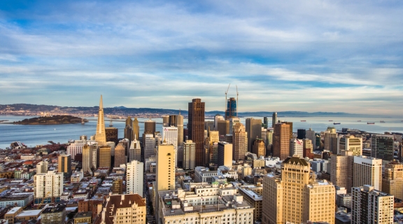 Aerial view of downtown San Francisco, with a skyscraper under construction
